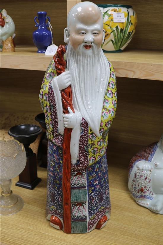 A large Chinese famille rose figure of Shou Lao and a similar figure of Budai tallest 61cm